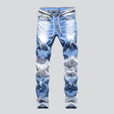 White color painted ripped jeans