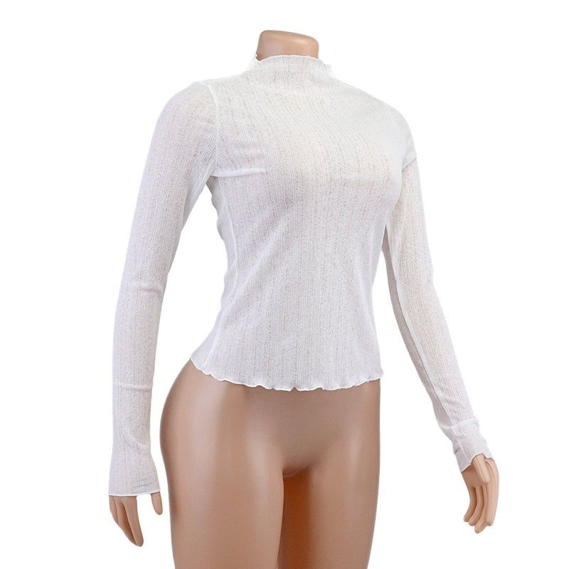 Bonita blusa de malla transparente con copos de nieve, cuello alto y dobladillo con volantes