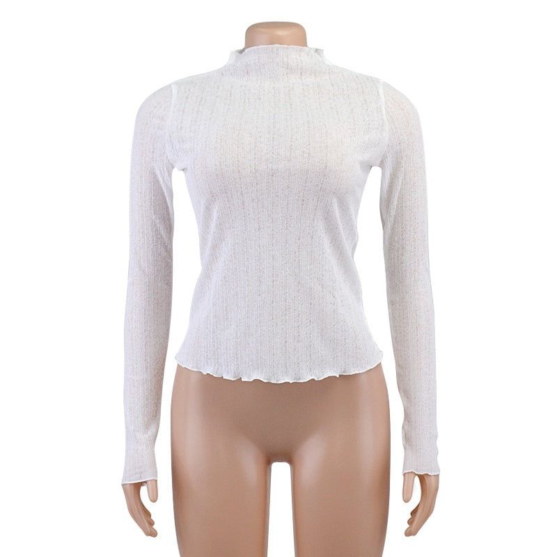 Bonita blusa de malla transparente con copos de nieve, cuello alto y dobladillo con volantes