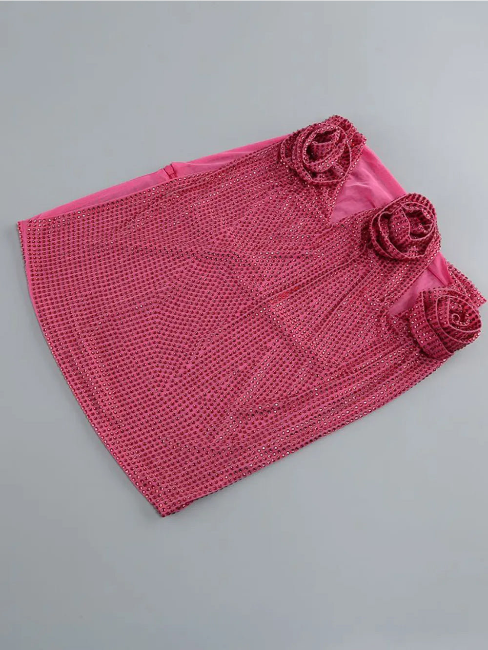 Conjunto de top y falda con aberturas LINNE en rosa