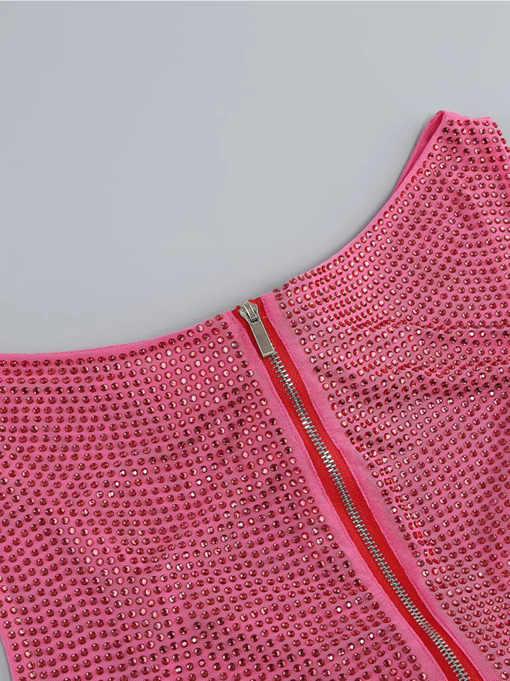 Conjunto de top y falda con aberturas LINNE en rosa