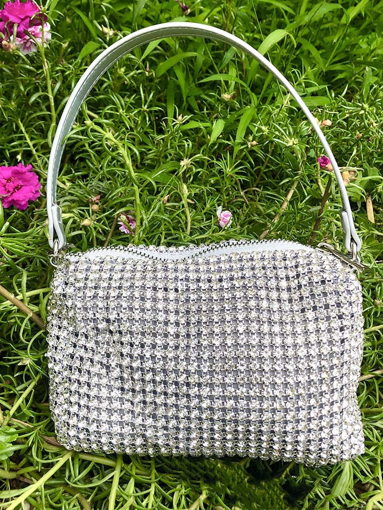 Bolsa con cremallera y diamantes de imitación