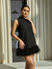 Minivestido de plumas Nisha en negro 