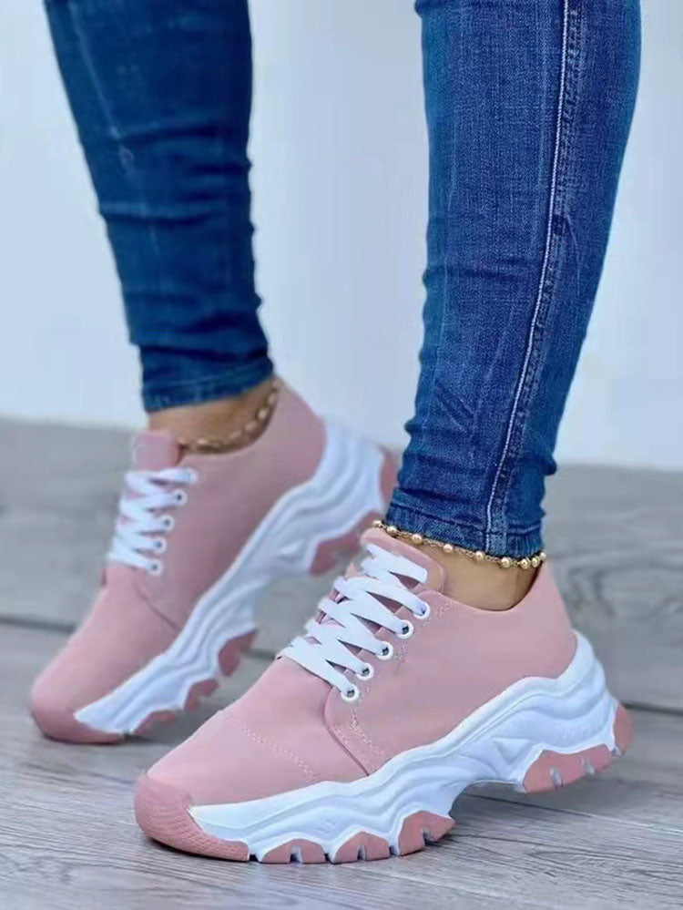 Zapatillas deportivas con cordones y bloques de color