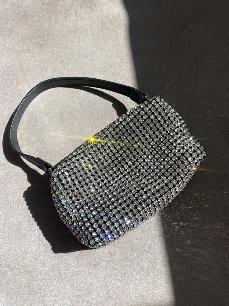 Bolsa con cremallera y diamantes de imitación