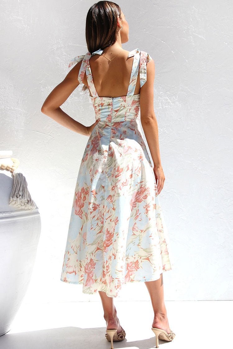 Vestido midi de verano con tirantes finos, corte entallado y vuelo, estampado floral - Albaricoque