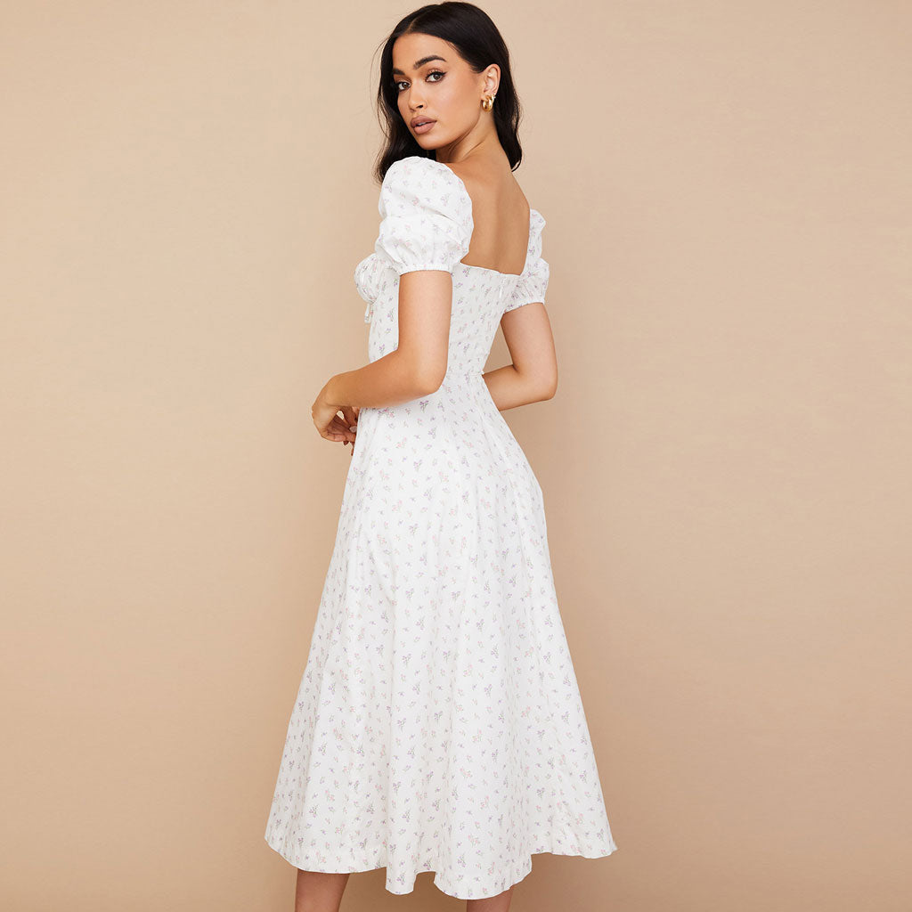 Bedrucktes Maxi-Sommerkleid mit Puffärmeln und hohem Schlitz - Weiß