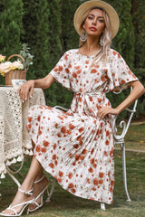 Vestido midi plisado con estampado floral, cuello redondo y manga corta - Blanco