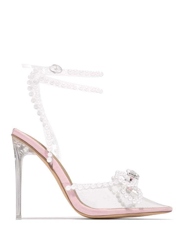 Transparente High Heels mit spitzer Spitze und Perlenschleife